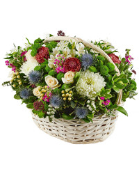 basket of chrysanthemums and roses. USA